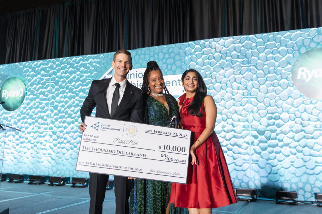 JA Dallas Board Chair Stephen Tigh, JA Dallas Vice President of Educational Impact Keshia Bruno and 2025 JA Student of the Year Palak Patel